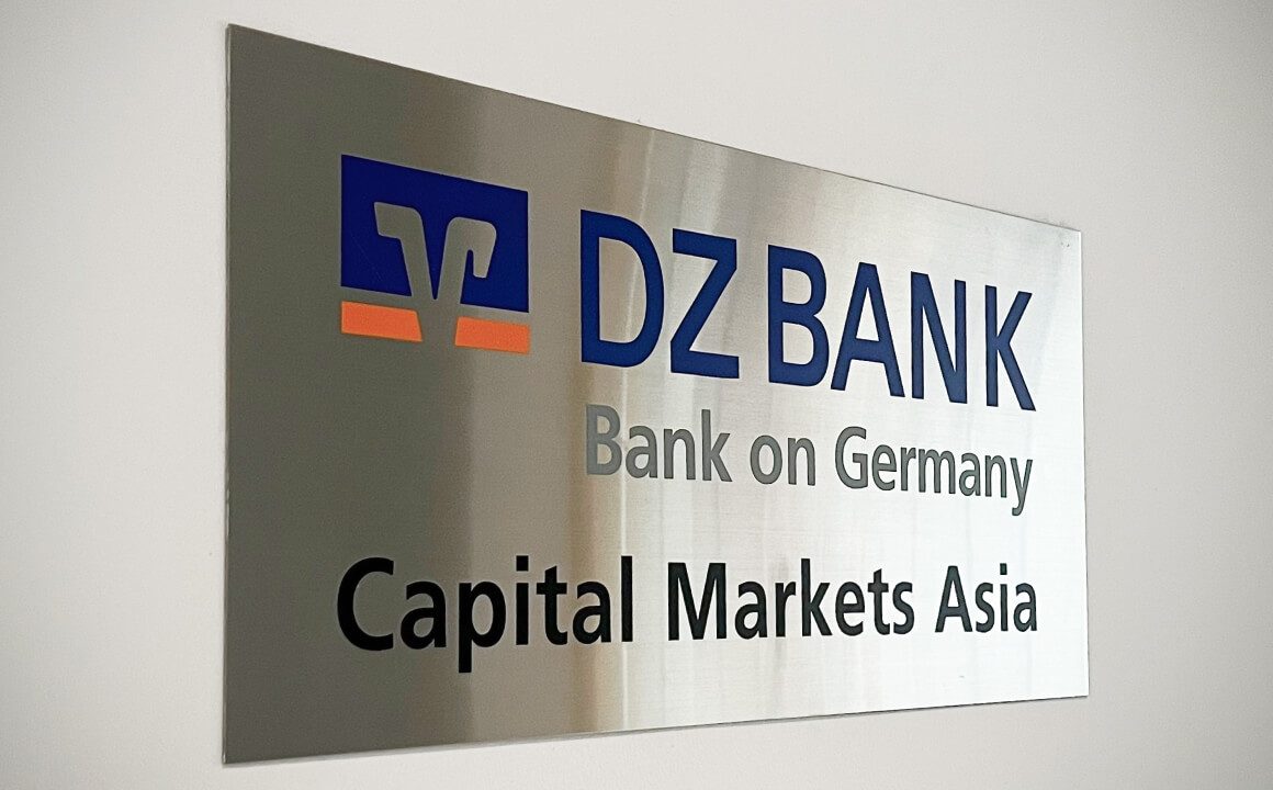 The door plate of one of the DZ BANK Singapore branch’s teams: Capital Markets Asia, with the DZ BANK logo and word mark
